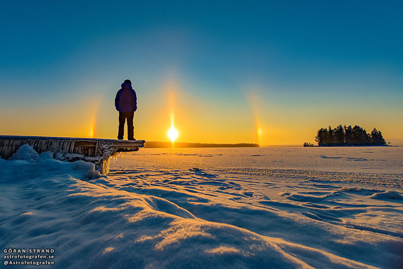 Midwinter sunset with a bright solar halo.