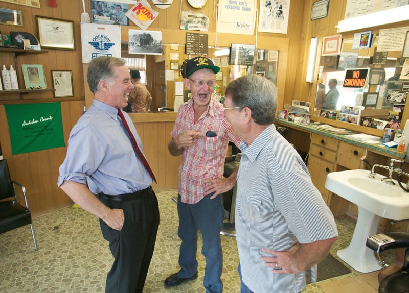 And once in a while you get to shoot an image in a room full of mirrors, three staff plus a TV crew, and avoid getting any of them in the shot. July 30 2003, Gov. Howard Dean visits a barber shop in Audubon IA