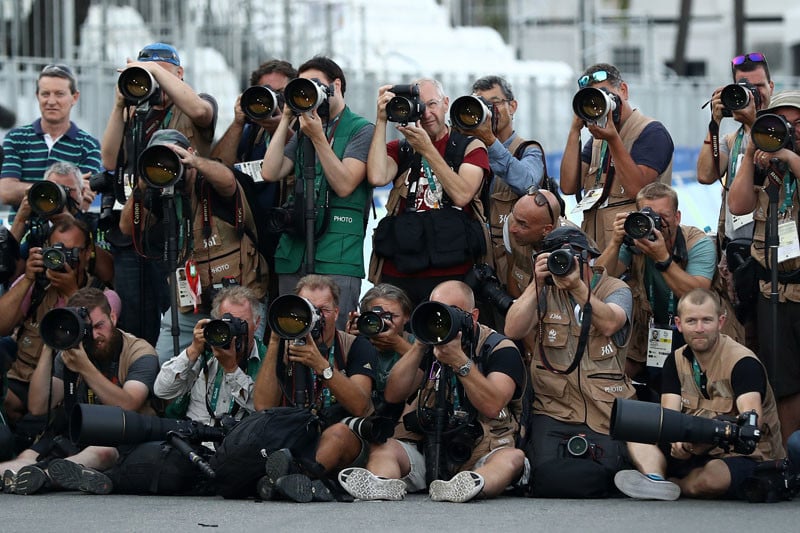 RIO DE JANEIRO, BRAZIL - AUGUST 06:  Photographers are seen at the medal ceremony for the Men's Road Race on Day 1 of the Rio 2016 Olympic Games at the Fort Copacabana on August 6, 2016 in Rio de Janeiro, Brazil.  (Photo by Ezra Shaw/Getty Images)