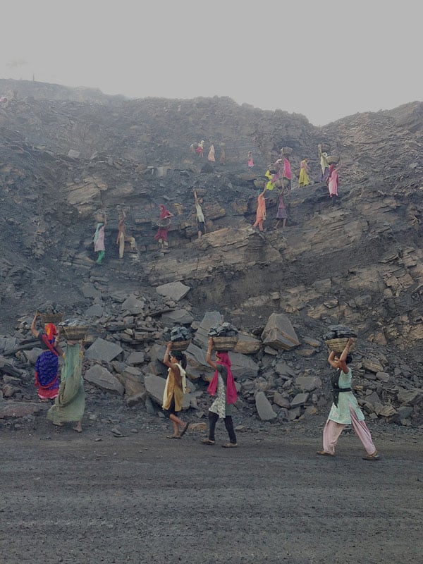 Coal thieves work very early in the morning before the mine officials come inside the mines in Jharia.