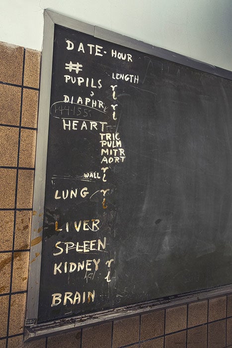 Pathologist's chalkboard in an autopsy room / morgue 
