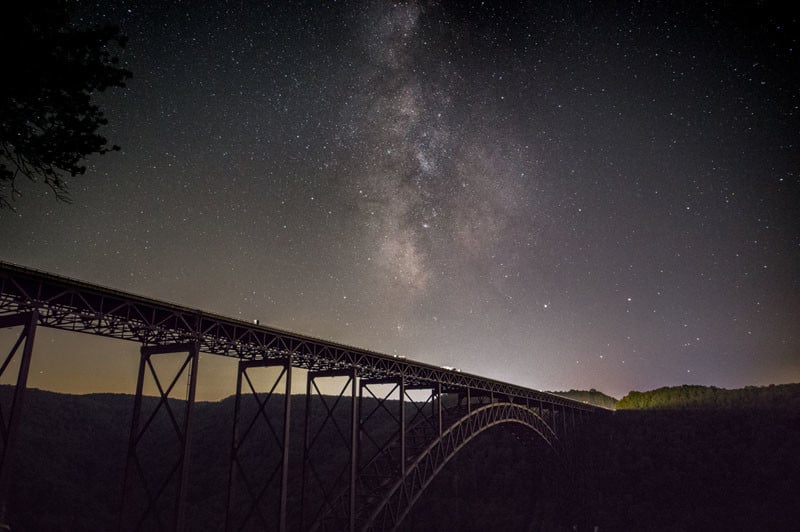 Here, the New River Gorge Bridge was shot at moon set early in the evening. I waited 2 hours later to shoot the Milky Way when it reached the center point of the bridge as it moved through the sky. ISO 3200, f/2.8, 15 secs.