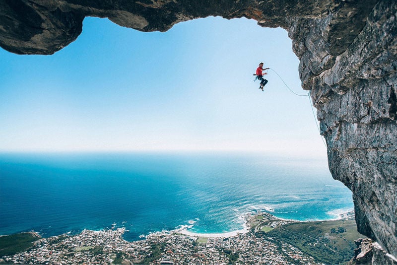 Micky Wiswedel, South Africa with his shot of climber Jamie Smith mid-fall as he attempts a new route on Table Mountain, Cape Town.