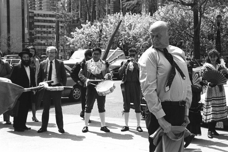 Mayor Koch tussles with a bull of sorts on the plaza at City Hall in 1988.