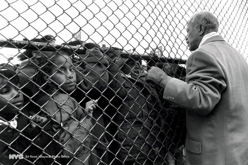 January 8, 1992. Mayor Dinkins chats with schoolchildren after an event.