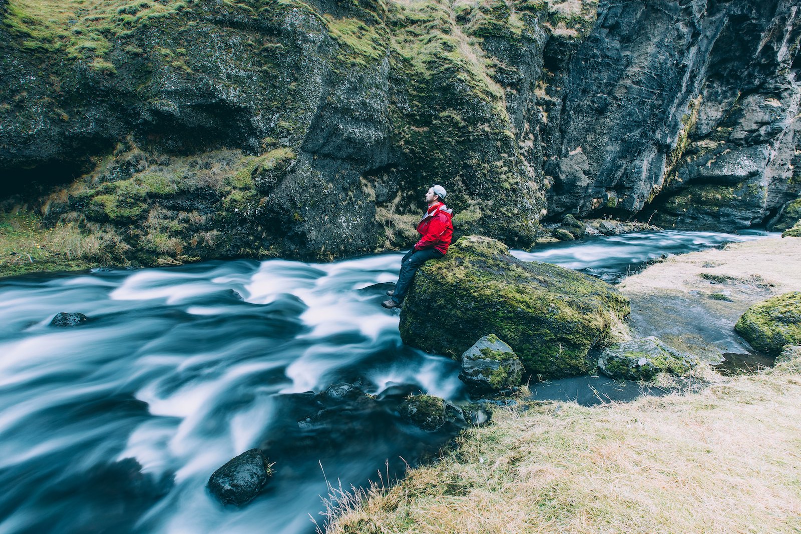 iceland-river-man-on-rock