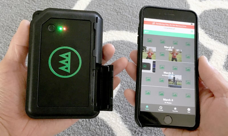 The GNARBOX 1.0 backup device next to a smartphone
