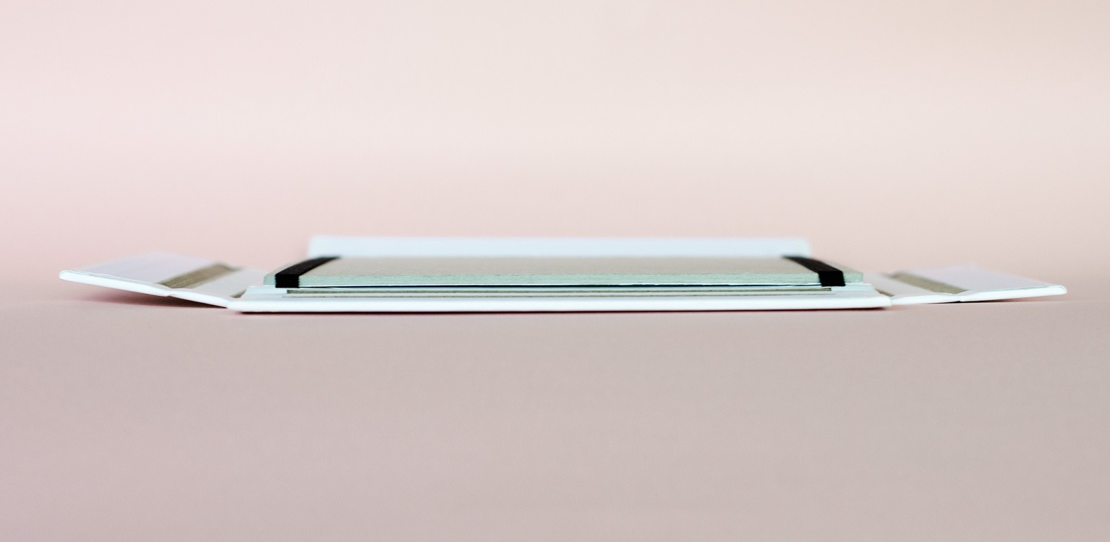 Flikframe is a Nail-Free Restickable and Collapsible Picture Frame ...