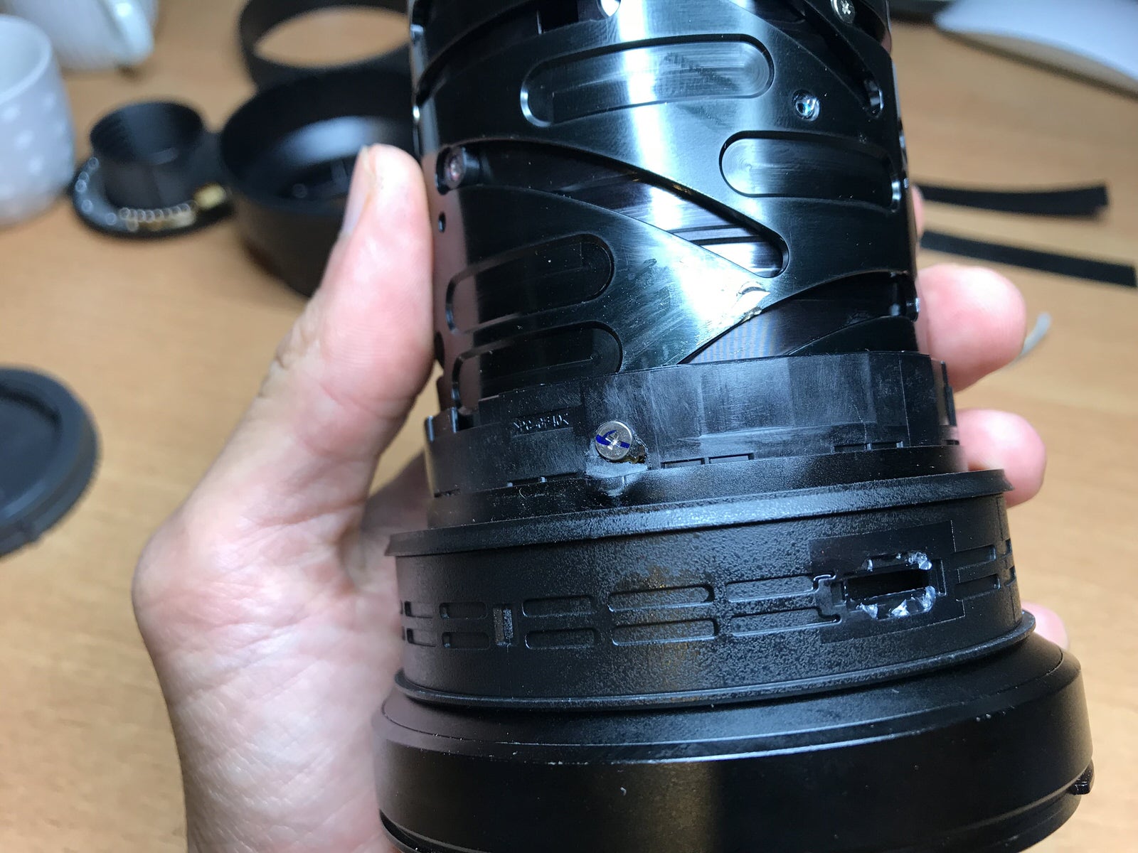 I Took Apart My $2,300 Sony Lens to (Try to) Fix It Myself | PetaPixel