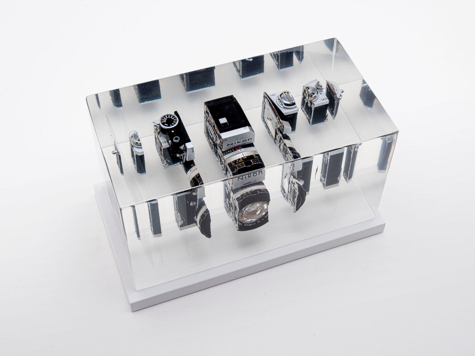These Vintage Cameras Were Sliced Up and Frozen in Resin | PetaPixel