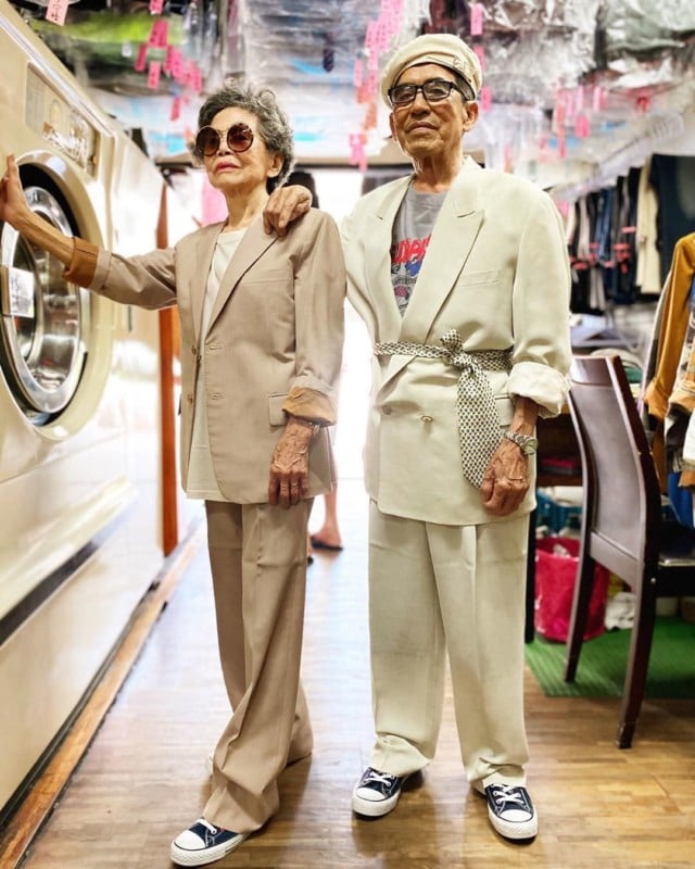 Elderly Couple Shoots Fashion Photos with Clothes Left at Their Laundromat