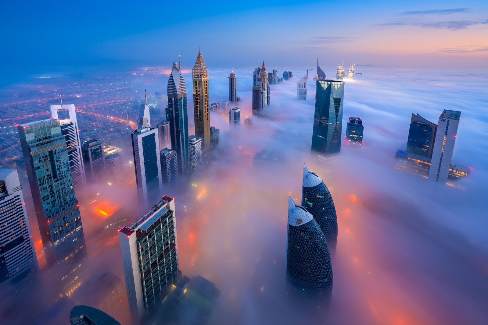 Photographer Captures Skyscrapers in Dubai Rising Above the Clouds