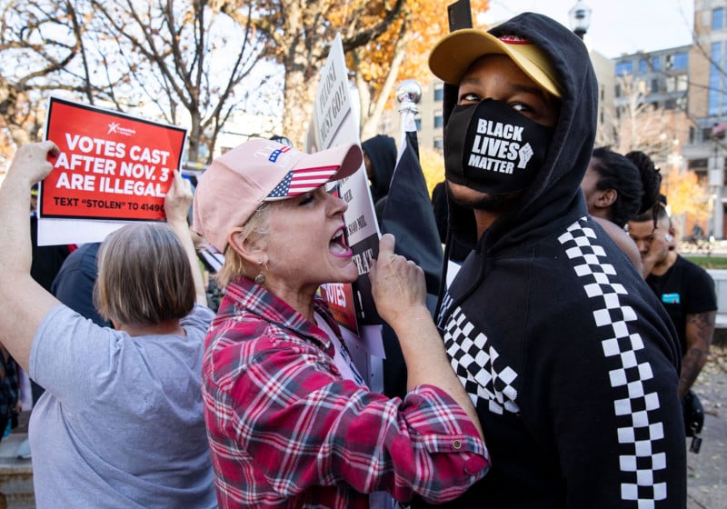 A Trump support yells in the face of Darin Hicks during a post-election Trump rally that coincided with a Black Lives Matter rally at the State Capitol in Madison, Wisconsin, Nov. 6, 2020. It's worth noting that we were also in the middle of a global health pandemic where the state of Wisconsin had mandated the wearing of masks. Photo © 2020 by Pete Souza