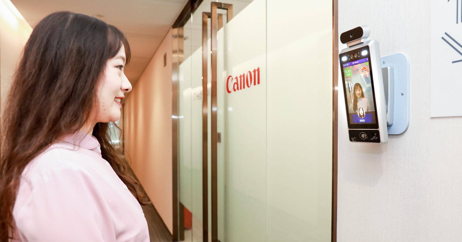 Canon Uses AI Cameras That Only Let Smiling Workers Inside Offices