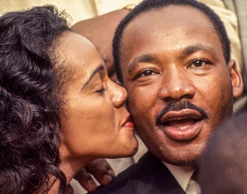 Coretta Scott King bussing Martin Luther King Jr. on the cheek following his speech in Montgomery, Alabama, at the culmination of the Selma March, March 25, 1965