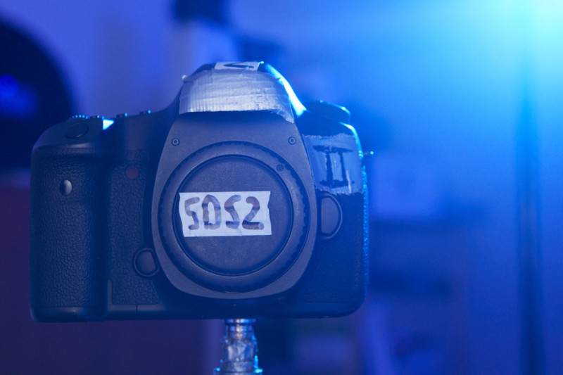 A DSLR camera on a tripod