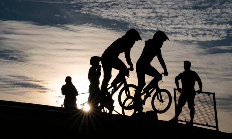 Silhouette of BMX bikers