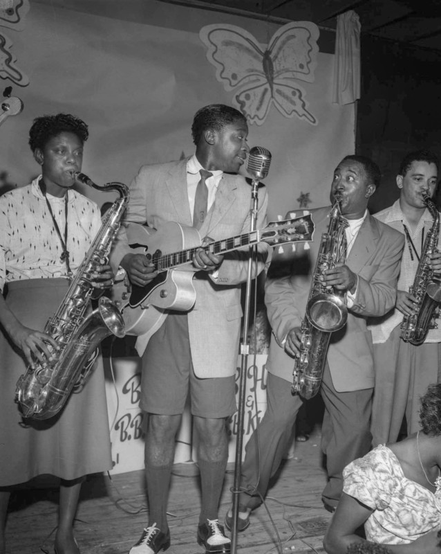 B.B. King performing on stage at The Hippodrome, Beale Street in Memphis, TN, c. 1950 © The Ernest C. Withers Family Trust, courtesy CityFiles Press.