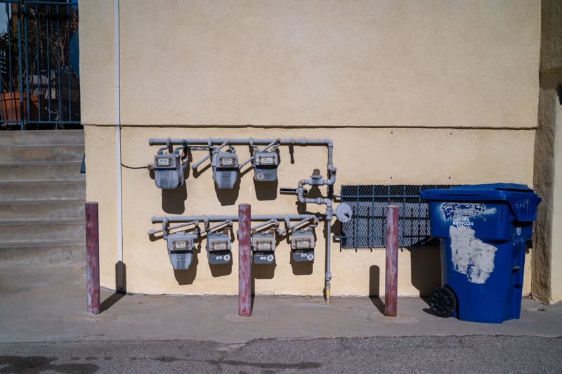 A photo of meters outside a building