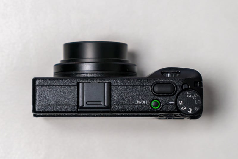 The Ricoh GR IIIx camera top-down view