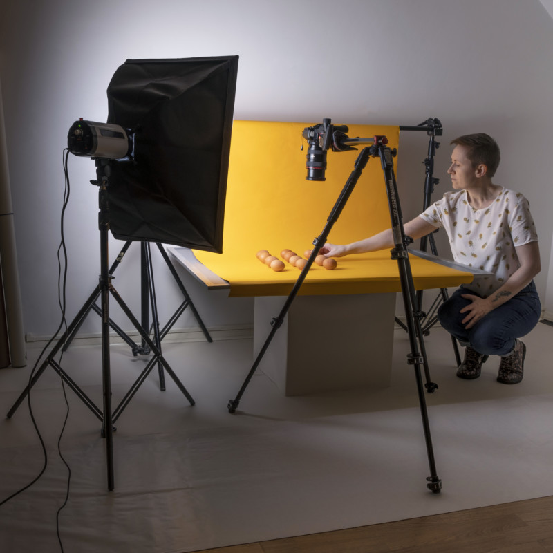 A savage universal backdrop arranged on a small table for food photography