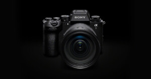 A black camera with a large lens.