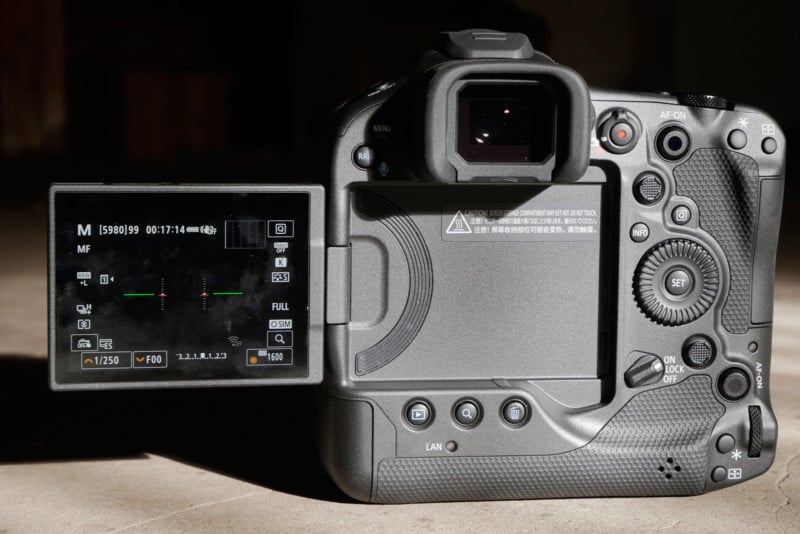 Canon EOS R3 back with screen flipped out.