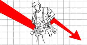 An illustration of a photographer in front of a declining sales chart