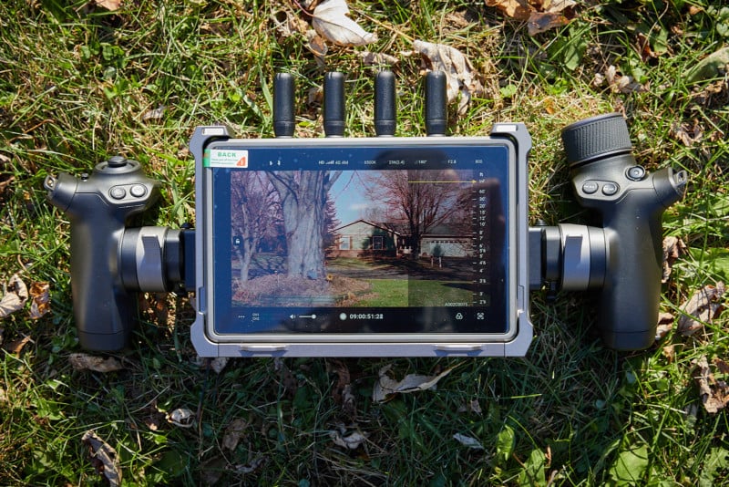 DJI High-Bright Remote Monitor with Ronin 4D handgrips.