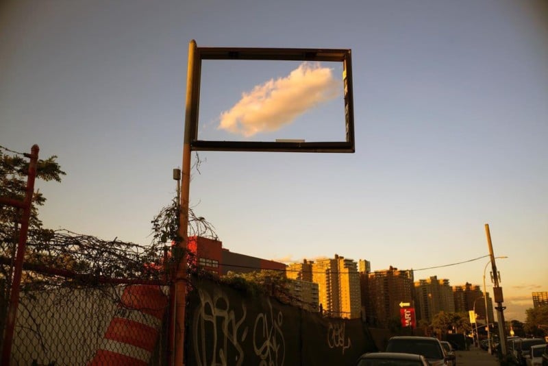 A cloud framed in an empty billboard
