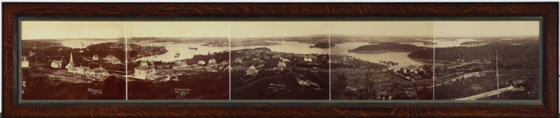 A vintage panoramic photo of Sydney and the harbor from 1875
