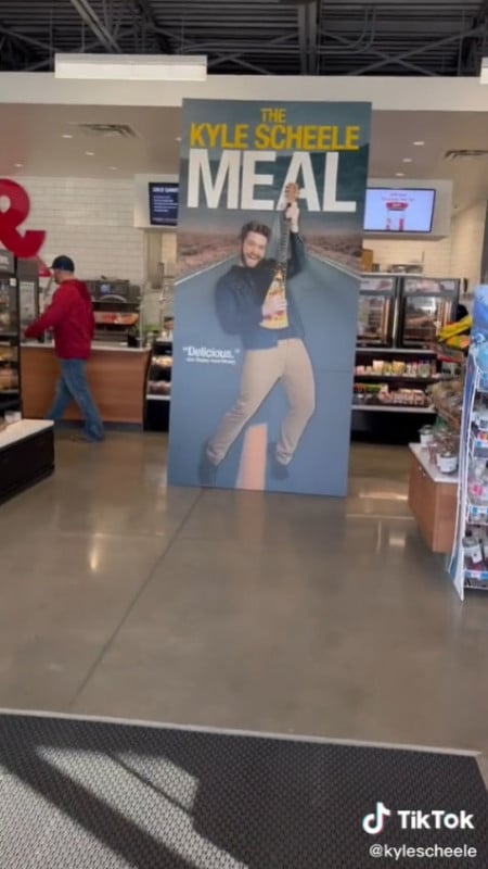 A giant cardboard cutout placed in a gas station as a prank