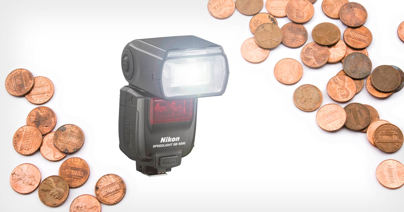 A Nikon camera flash surrounded by pennies