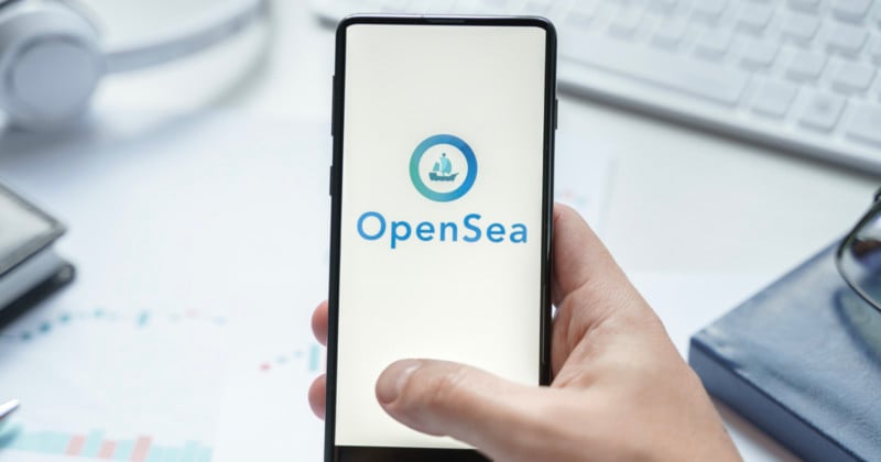 OpenSea logo on a smartphone