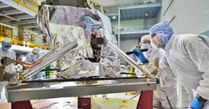 NASA engineers inspect the MIRI instrument