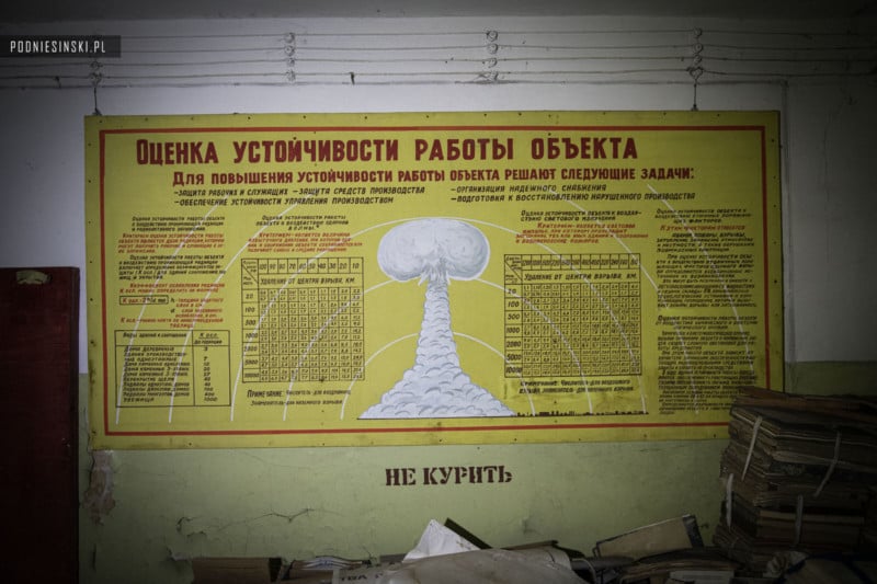 An informational poster about atomic fallout in an underground bunker