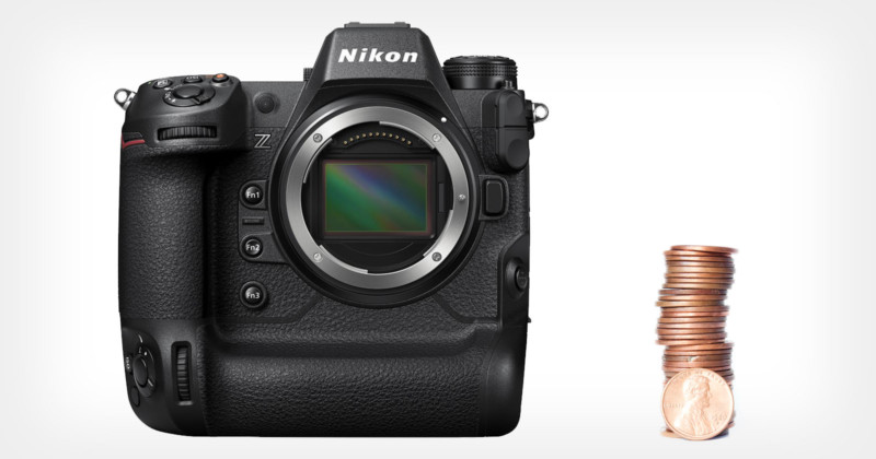 The Nikon Z9 mirrorless camera next to a stack of pennies