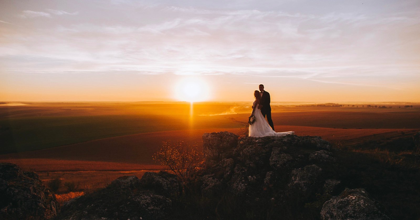 Wedding couple at a sunset
