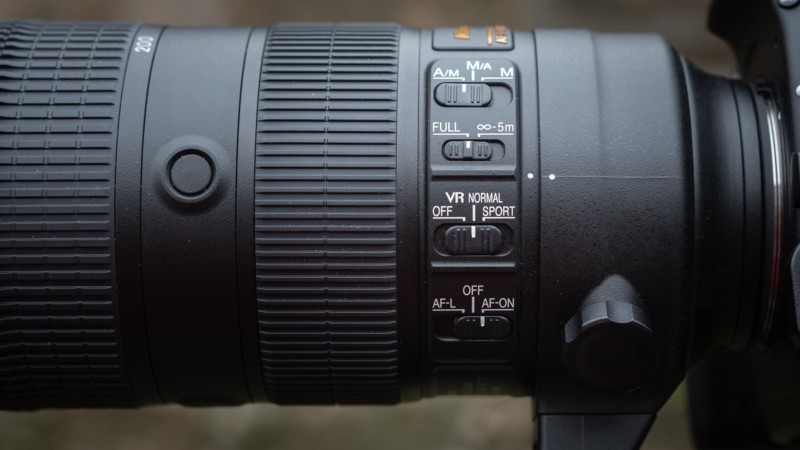 Lens settings switches on the side of a lens