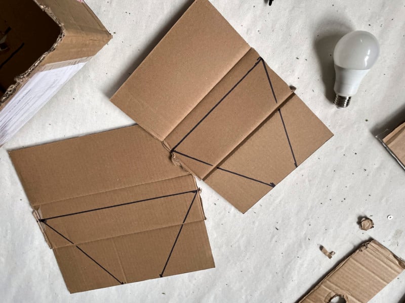 Pieces of cardboard with lines where cuts need to be made