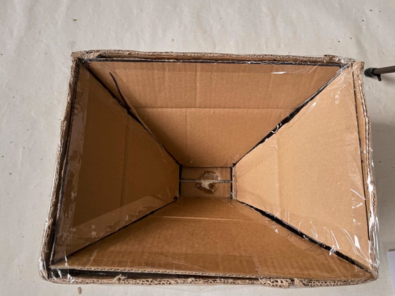 A softbox body created with cut pieces of cardboard