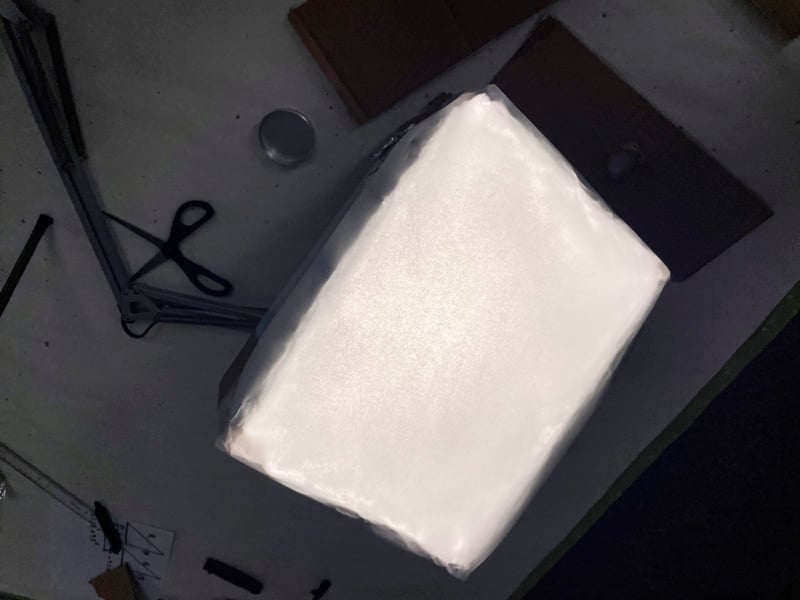 A DIY softbox with baking paper over the top to diffuse the light