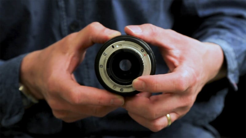 Opening and closing aperture blades in an old camera lens