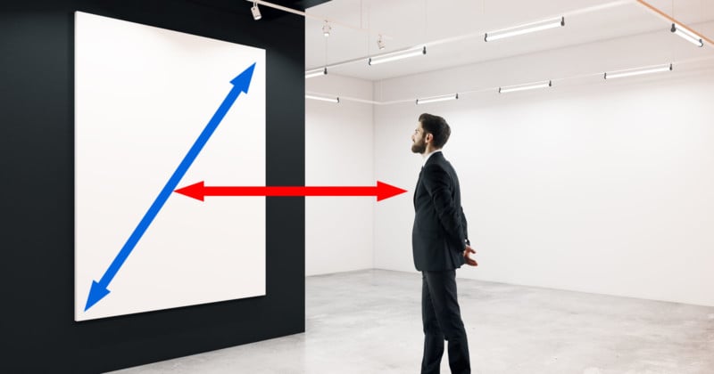 A man viewing a blank canvas in a gallery