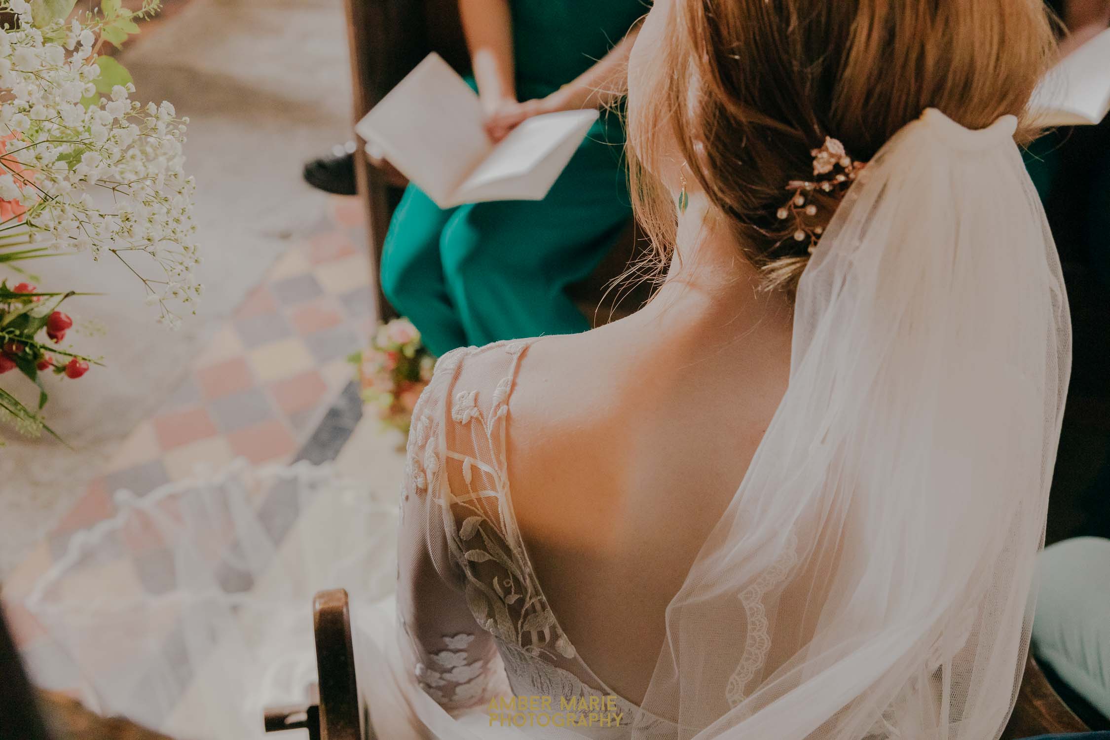 A bride sat down during a church ceremony