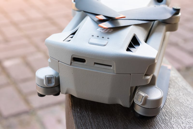 Rear of the DJI Mini 3 Pro with USB-C charging and Micro SD slot.