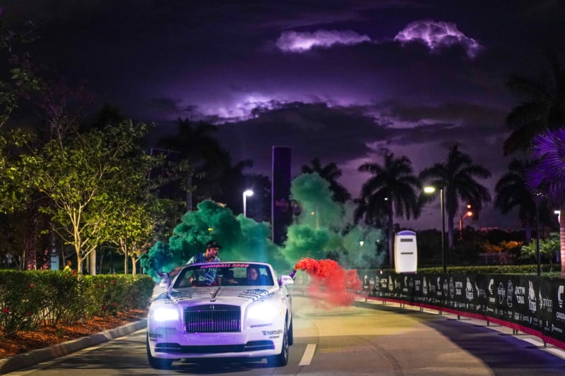 A car with lightning behind it