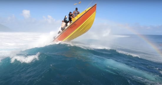 Shocking Footage of Wave Throwing Two Surf Photographers Off a Boat