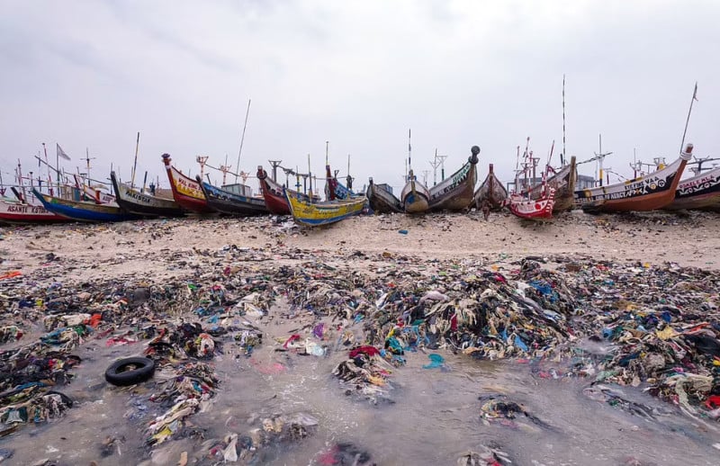 Mountains of clothes washed up on Ghana beach show cost of fast fashion