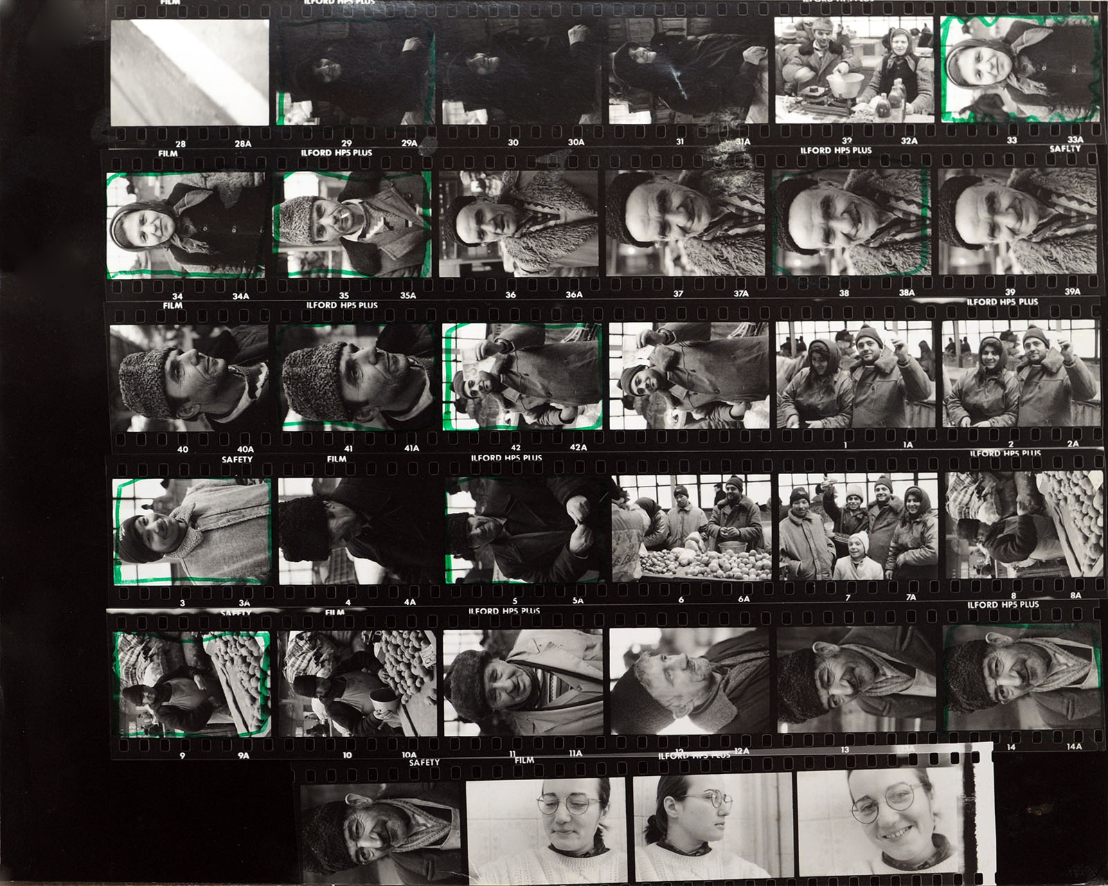 contact-sheet-of-old-black-and-white-film-negatives-on-traditional